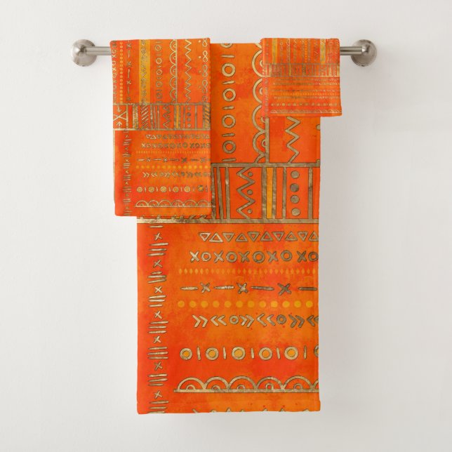 Motif ethnique tribal or sur orange vif (En situation)