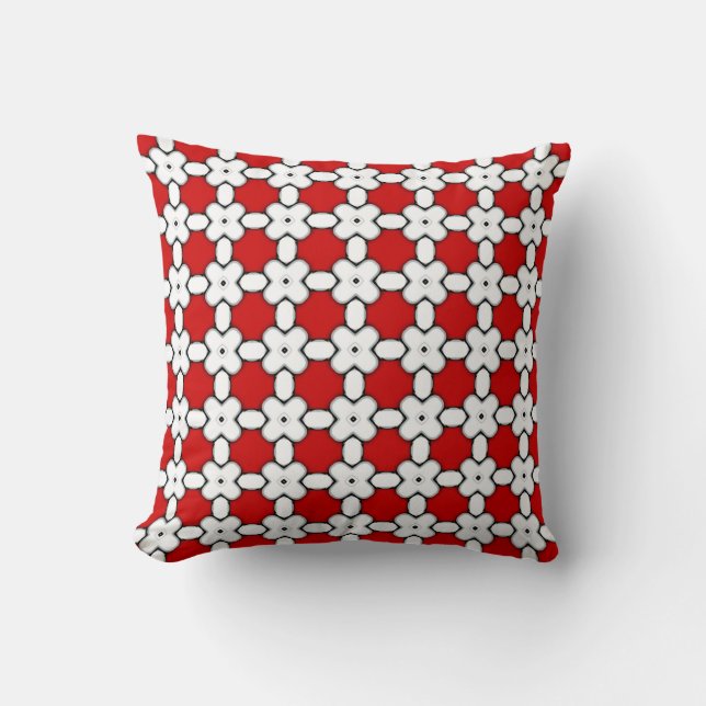 Motif floral rouge blanc sur un coussin à motif te (Recto)
