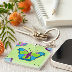 Motif papillon patchwork sur fond vert