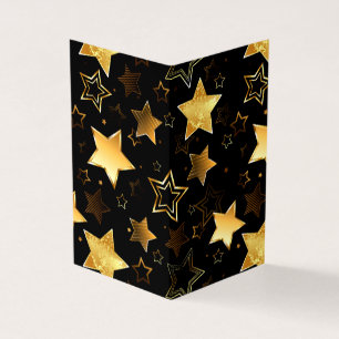 Motif sans couture avec des étoiles dorées
