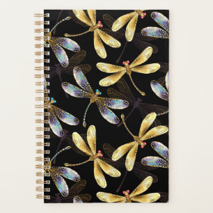 Motif sans couture avec libellules d'or