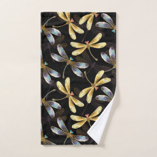 Motif sans couture avec libellules d'or