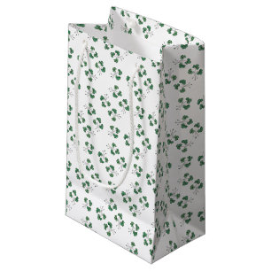 Motif Shamrock vert sur sac cadeau blanc