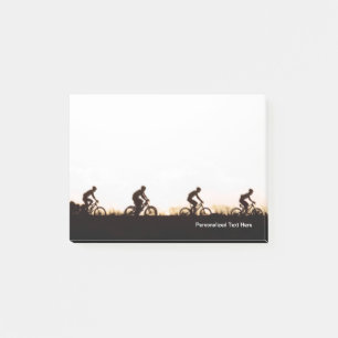 Mountainbike-Fahrer machen sich über die Talsperre Post-it Klebezettel