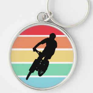 Mountainbiken auf Retro-Regenbogen Streifen Schlüs Schlüsselanhänger