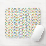 Mouse pad with a pattern of diverse smiley faces  mousepad<br><div class="desc">Mouse pad with a pattern of diverse smiley faces in multiple colors,  creating a playful and cheerful atmosphere. Below,  a white mouse rests on it.</div>