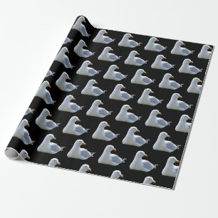 Möwe legt sich elegant an die schwarze Küste Geschenkpapier