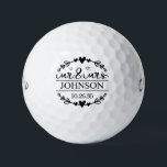 Mr & Mrs Wedding  Golfball<br><div class="desc">These Mr. & Mrs. Wedding golf balls are a great gift for your family,  friends and wedding party. They feature the new couple's married last name and wedding date in black encased in a curved heart wreath.</div>