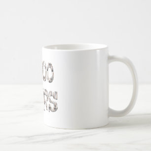 Mug 10000 heures avec une superposition de pinceaux.