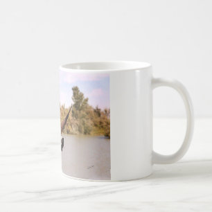 Mug canard volant au-dessus de l'eau photographie