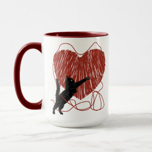 Mug Chat Noir Jouant Déraviser le Coeur Rouge