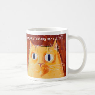 Mug Chat orange conflictuel avec les yeux ronds