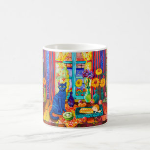 Mug Chat sur la table de la cuisine près de la fenêtre
