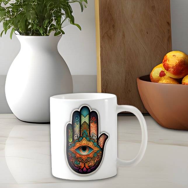 Mug classique à main Hamsa, 11 oz (Hamsa hand coffee mug sits on a kitchen counter)
