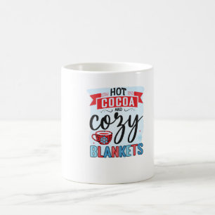 Mug Coca chaud et couvertures douillettes
