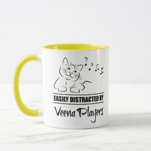 Mug Curious chat facilement distrait par les joueurs d