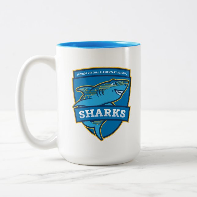 Mug de l'école élémentaire virtuelle de Floride (b (Gauche)