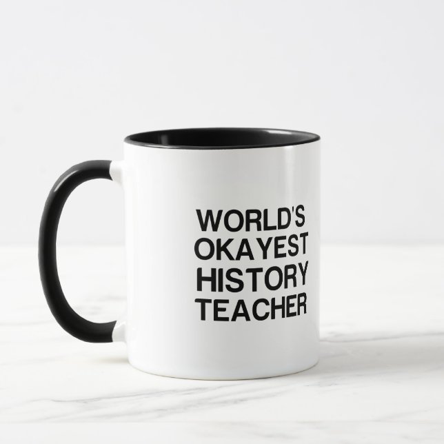 MUG ENSEIGNANT DE L'HISTOIRE LA PLUS OKAYEST AU MONDE (Gauche)