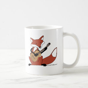 Mug Fox jouant la guitare