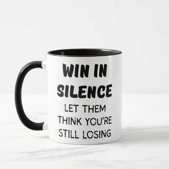 MUG GAGNER EN SILENCE LAISSEZ-VOUS PENSER QUE VOUS PER (Gauche)