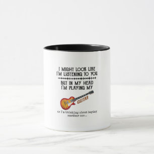 Mug J'ai peut-être l'air de vous écouter, mais dans