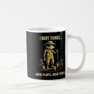 Mug J'enterre des choses peut-être des plantes peut-êt