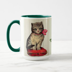 Mug Kitten de Noël assis avec un cou rouge