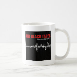 MUG LE NOIR ATTACHE DU RUBAN ADHÉSIF AU LOGO