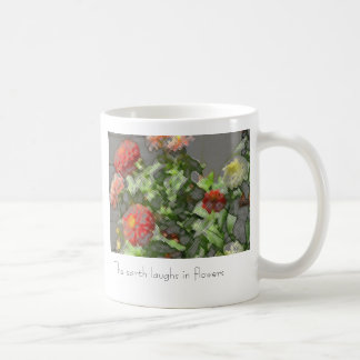 Mug les zinnias, la terre rit en fleurs
