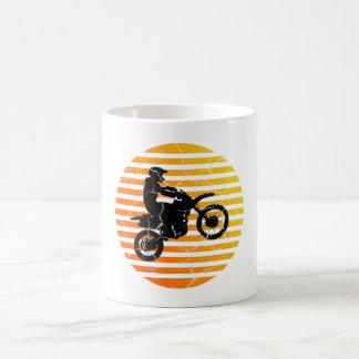 Mug Motocross Dirt Bike Catching Air at Sunrise Sunset