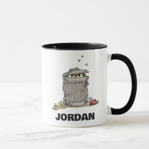 Mug Oscar vintage dans une poubelle