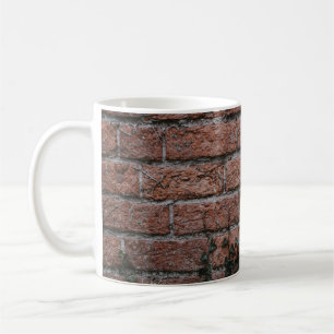 Mug Plantes à feuilles vertes près du mur de briques
