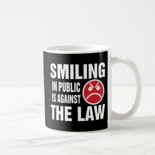 Mug Sourire en public est contre la loi