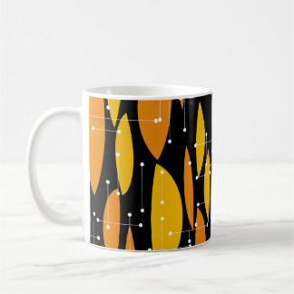 Mug Style atomique, motif géométrique noir orange.