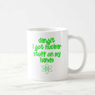 Mug Substance nucléaire sur des mains