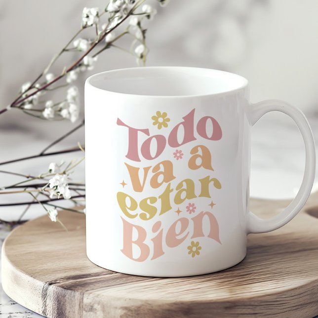 Mug "Todo Va a Estar Bien" Pastel Inspiration Super ("Todo Va a Estar Bien" Pastel Groovy Inspiration Coffee Mug on a sunny neutral boho kitchen table.)