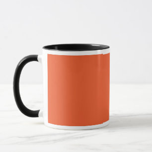 Mug un arrière - plan orange avec une bordure noire