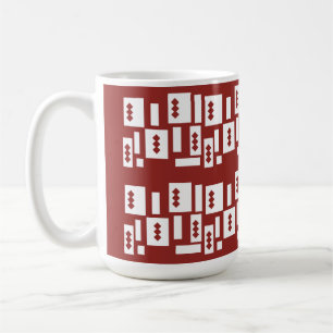 Mug Un tapis rouge avec un motif texturé est étalé sur