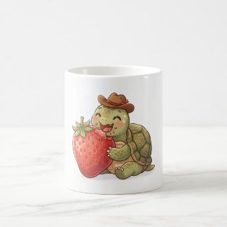 Mug une tortue mignonne mange une fraise