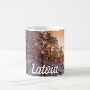 Mug Winter sunset in pine forest near sea