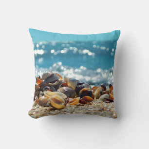 Muscheln und ein funkelnder Ozean Kissen