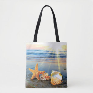 Muscheln und Seestern am Strand Tasche