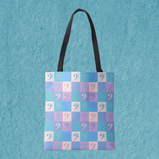 Music Bass Clef Pastel Pattern Tasche (An all over print tote bag featuring a pattern of bass clefs in yellow, pink, purple and blue.)