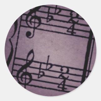 Musikalische Noten auf rauem Lila Runder Aufkleber