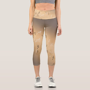Musikalische Noten im Mondlicht Goldene braun Capri Leggings