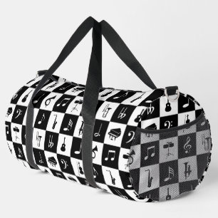 Musiknoten und Instrumente auf Quadraten Duffle Bag