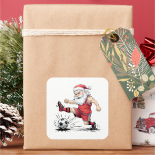 Muskelbepackter Fußball-Santa tritt Ball Quadratischer Aufkleber