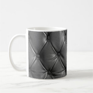 Muster der schwarzen Echtledertextur, das als verw Kaffeetasse