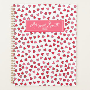 Muster-Planer für niedliche rosa und rote Herzen Planer