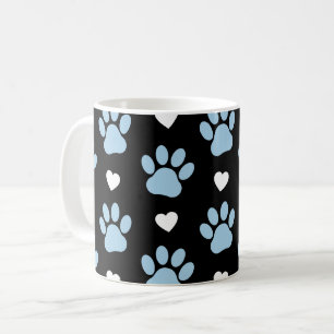 Muster von Paws, Hundeschäften, blauen Paws, weiße Kaffeetasse